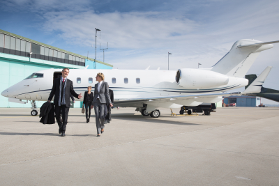 executive business team leaving corporate jet