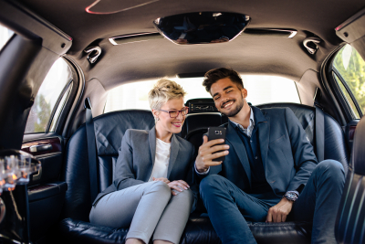 happy young people in limousine